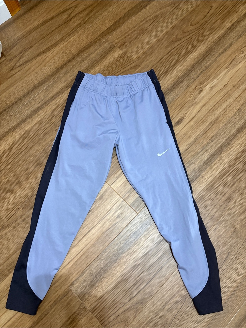 Nike Light Blue and Black Women's Therma-Fit slim Fit sweats.